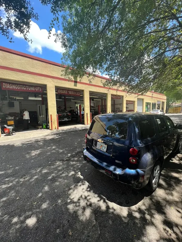 The AutoPlus shop in Lauderhill with open service bays